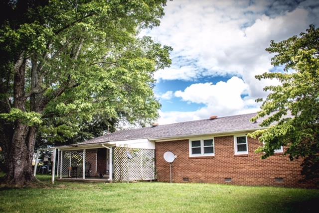 1143 Rabbit Trail Road Five Points, TN 38457 - Photo 5 of 13 a view of a house with a yard