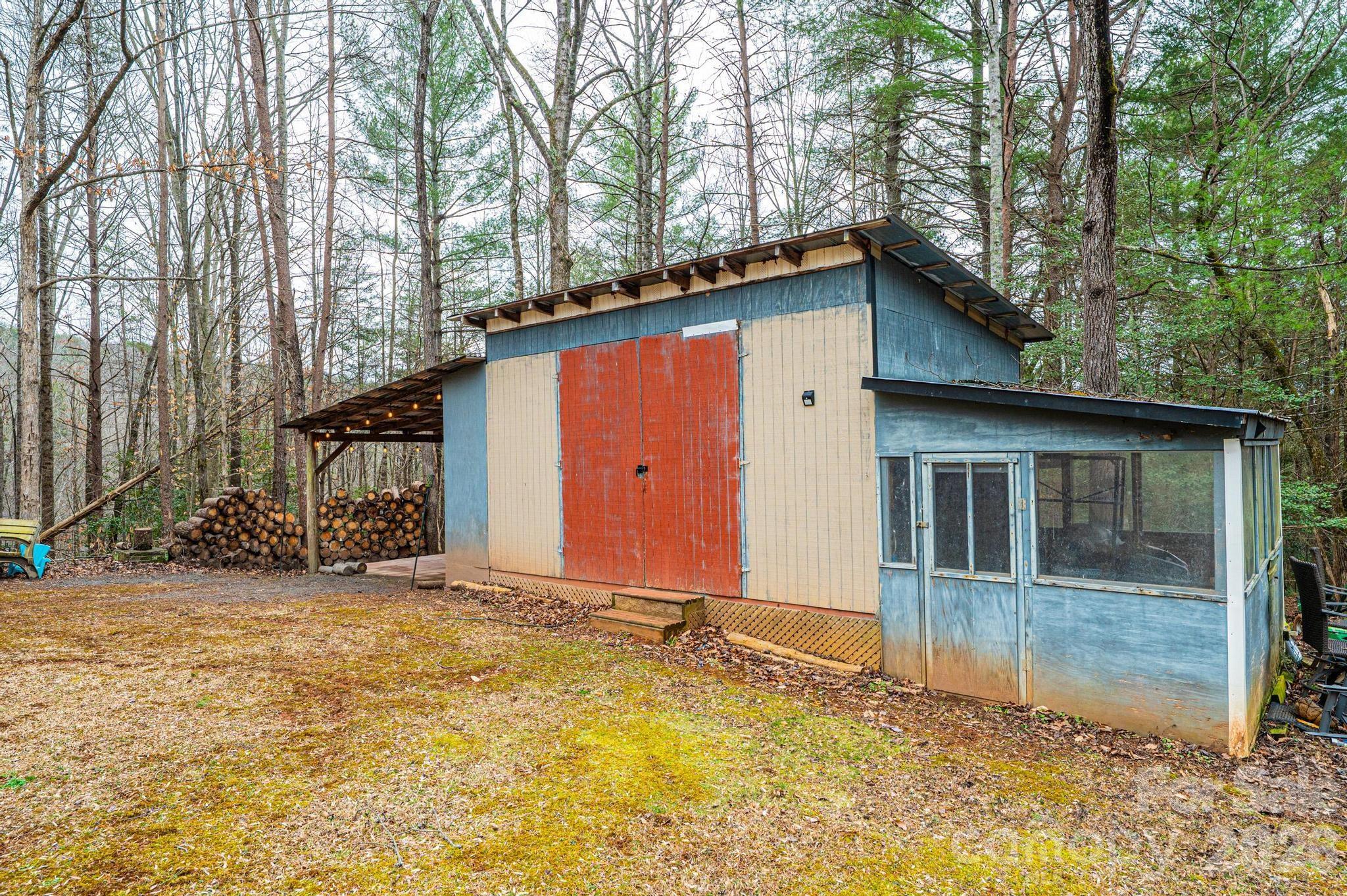 173 Croom Hollow Road Nebo, NC 28761 - Photo 17 of 43 a view of a house with backyard