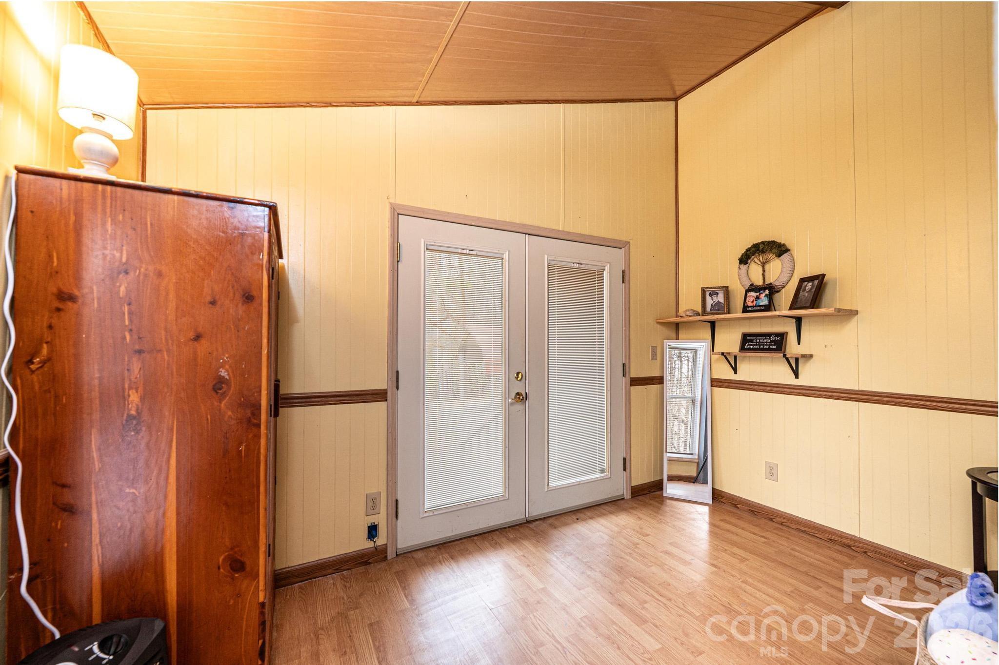 173 Croom Hollow Road Nebo, NC 28761 - Photo 30 of 43 a view of storage and utility room with wooden floor