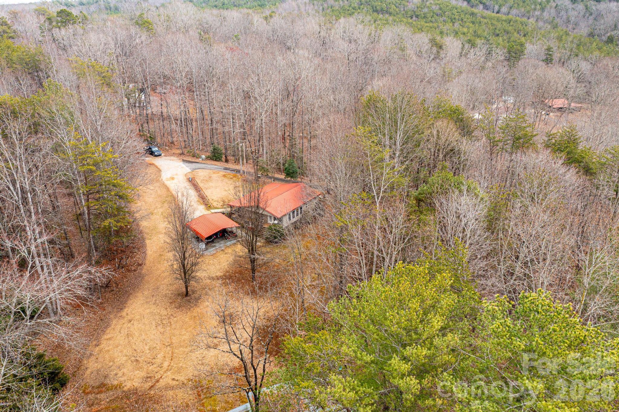 173 Croom Hollow Road Nebo, NC 28761 - Photo 10 of 43 a view of a backyard of the house