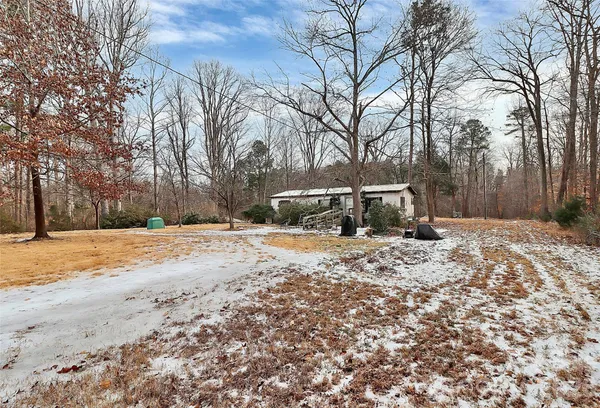 a view of covered with snow in front of house