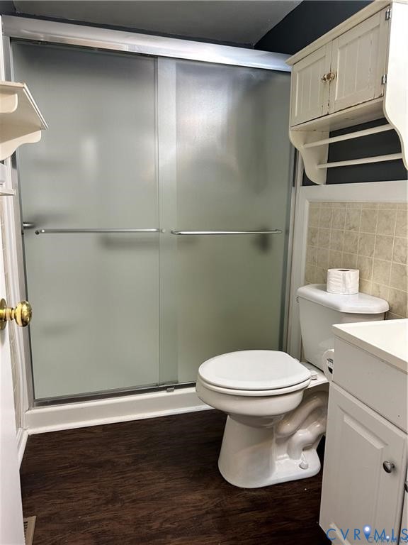 15817 Gatewood Road Dinwiddie, VA 23841 - Photo 3 of 4 Bathroom with frosted glass shower enclosure, wood