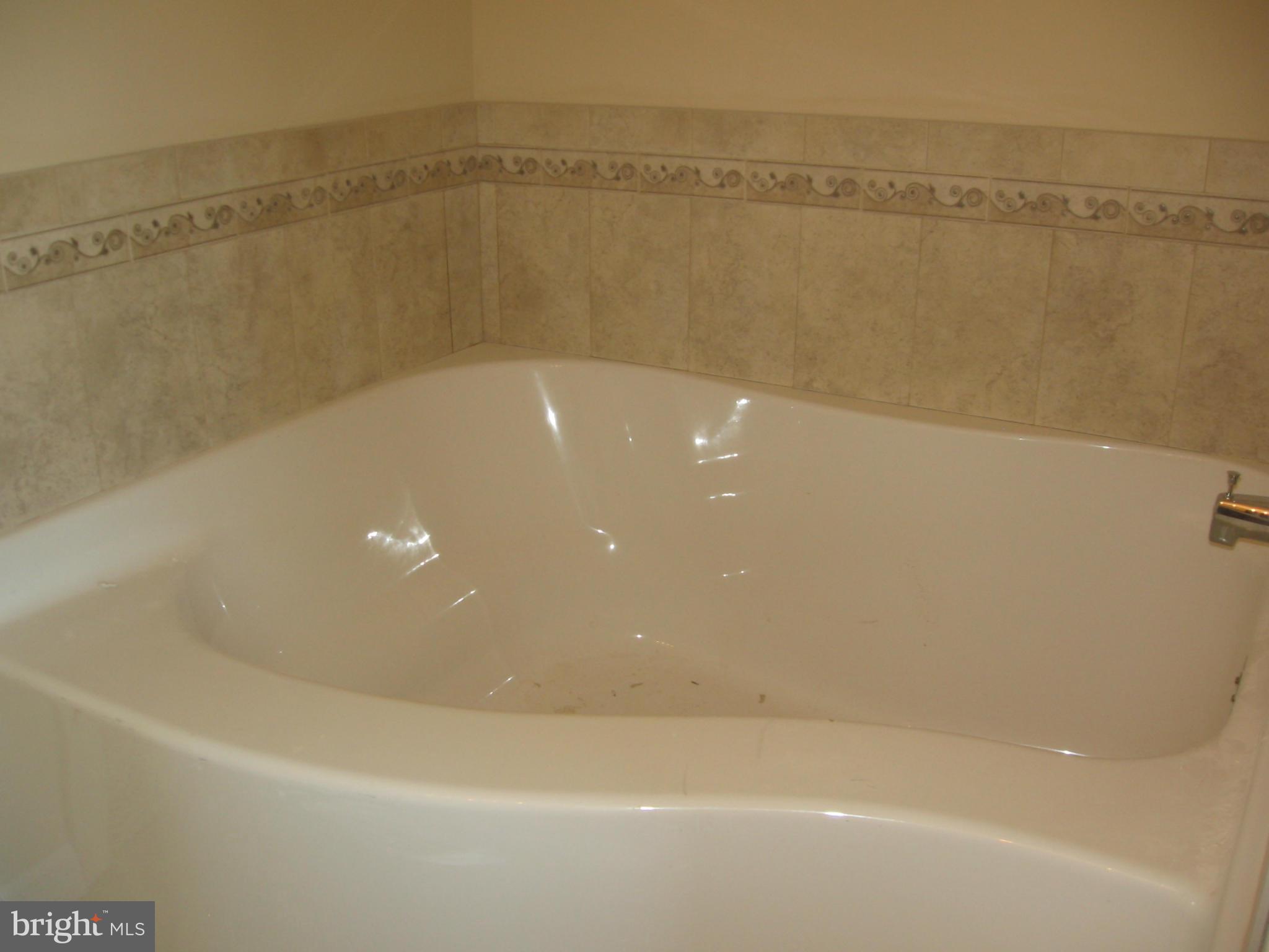 58 Gibson Road Inwood, WV 25428 - Photo 14 of 17 a view of a bathtub in a bathroom