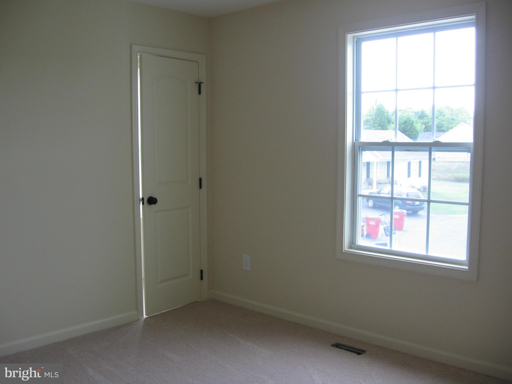 58 Gibson Road Inwood, WV 25428 - Photo 16 of 17 an empty room with a window