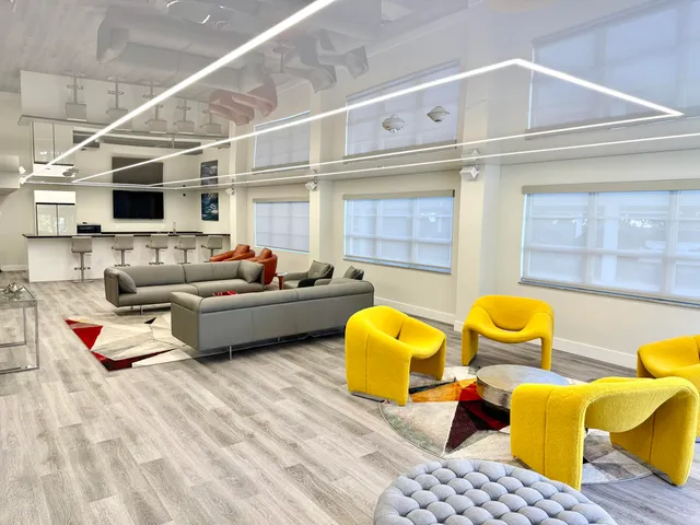 a kitchen with stainless steel appliances granite countertop a stove and a refrigerator