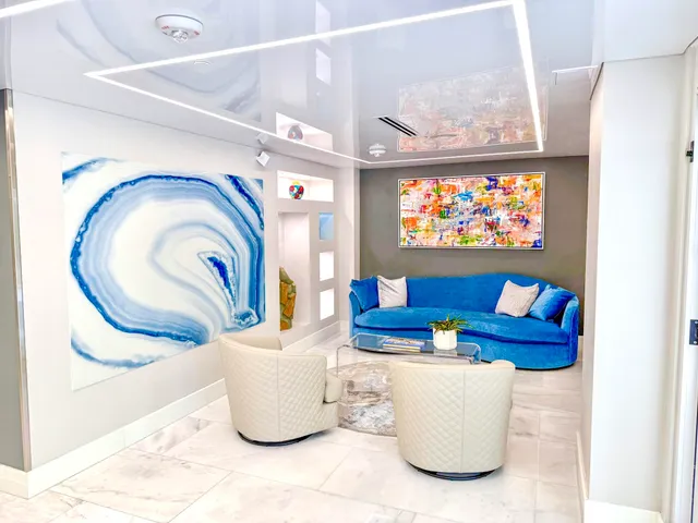 a view of living room with furniture and washer