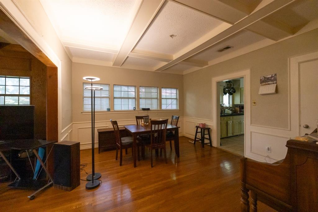 700 North Beacon Street Dallas, TX 75214 - Photo 6 of 13 a view of a dining room with furniture window and wooden floor