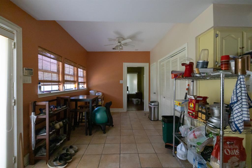 700 North Beacon Street Dallas, TX 75214 - Photo 8 of 13 a living room filled with furniture and a window