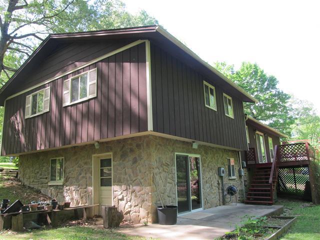 444 Sandy Road Dover, TN 37058 - Photo 3 of 18 View from the side of the home.