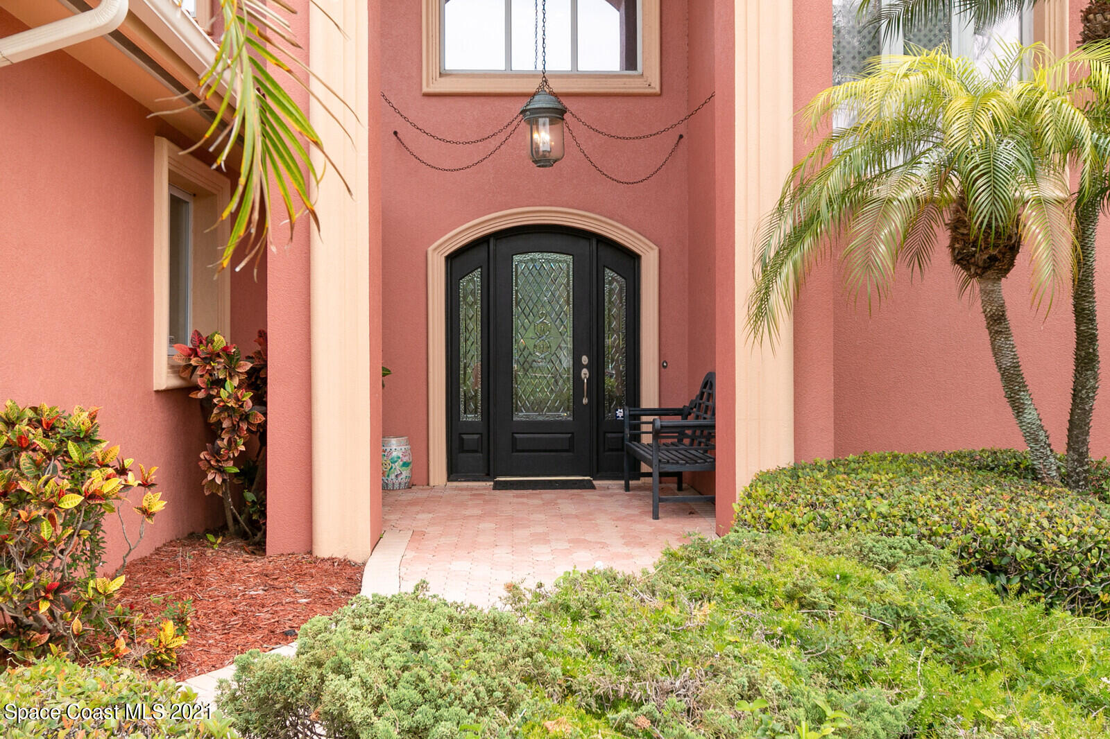 2021 Bali Road Cocoa Beach, FL 32931 - Photo 3 of 50 Cut Glass and Wood Front Door