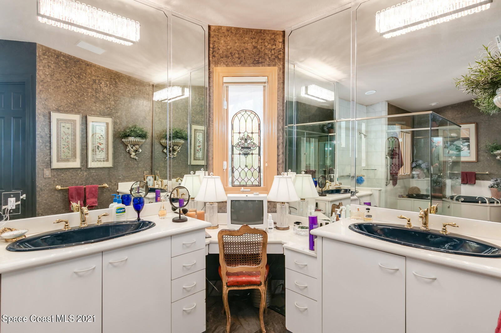 2021 Bali Road Cocoa Beach, FL 32931 - Photo 22 of 50 Dual vanities and seating in master bath