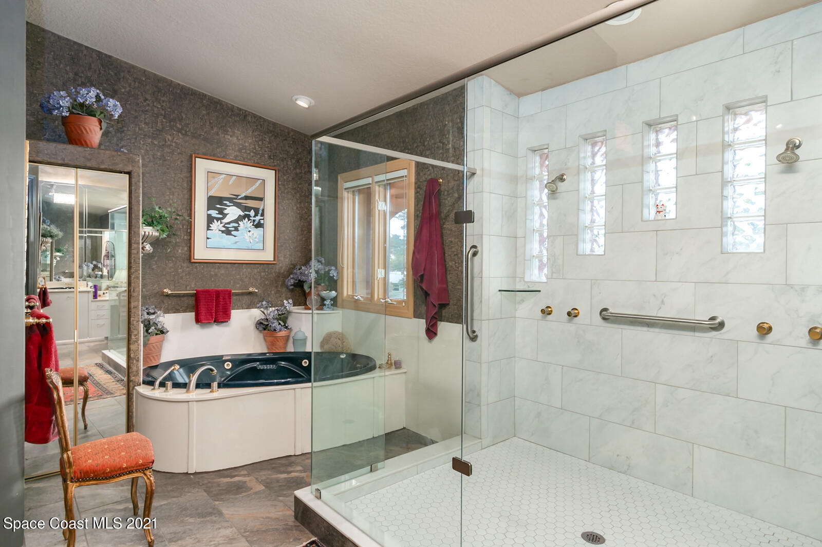 2021 Bali Road Cocoa Beach, FL 32931 - Photo 23 of 50 Massive remodeled walk-in shower