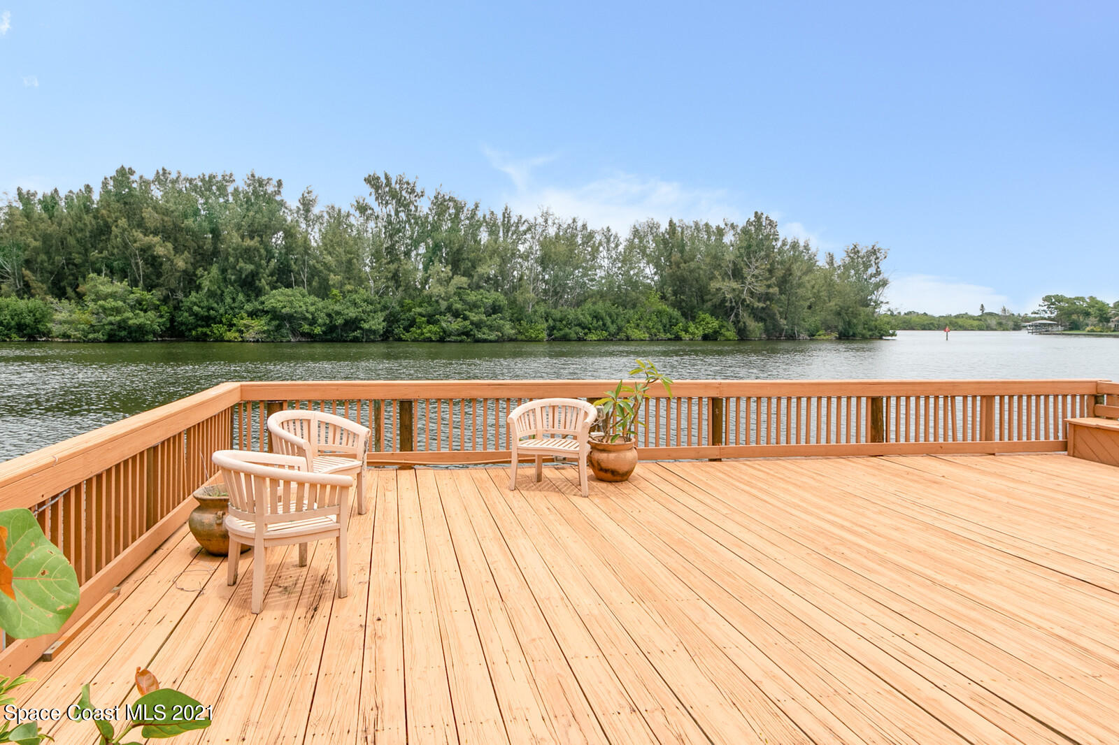2021 Bali Road Cocoa Beach, FL 32931 - Photo 4 of 50 Huge Deck directly on the Banana River