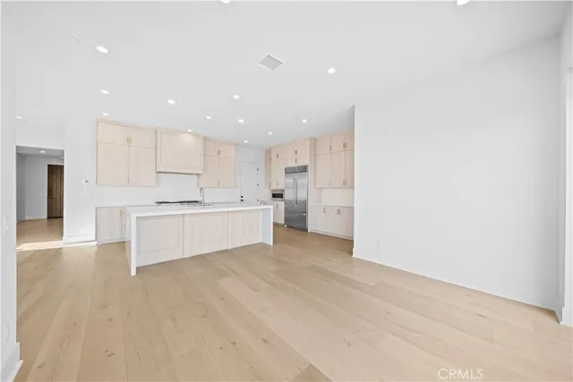 a view of kitchen with wooden floor