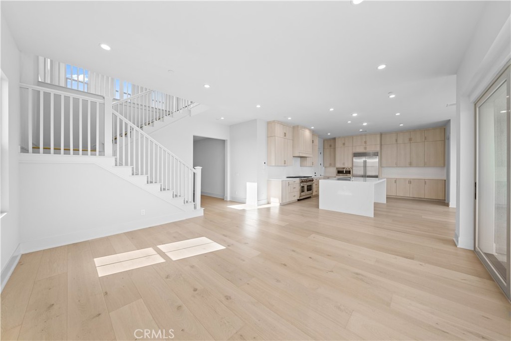 100 Mossvine Irvine, CA 92618 - Photo 12 of 44 a view of kitchen with wooden floor