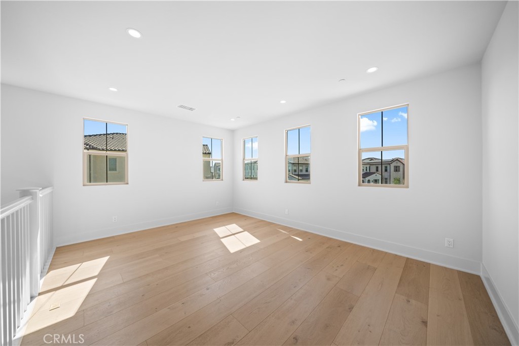 100 Mossvine Irvine, CA 92618 - Photo 18 of 44 an empty room with windows