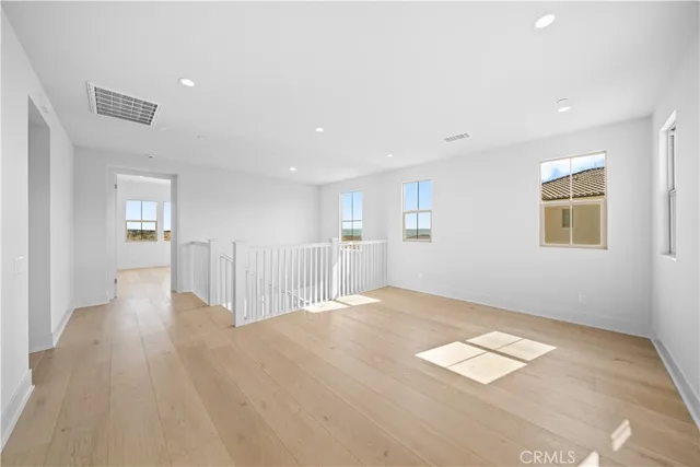 a view of a kitchen with a sink and a window