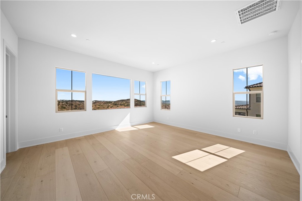 100 Mossvine Irvine, CA 92618 - Photo 21 of 44 a view of a kitchen with a sink and a window
