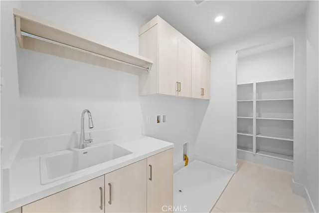 a white toilet next to a bathroom