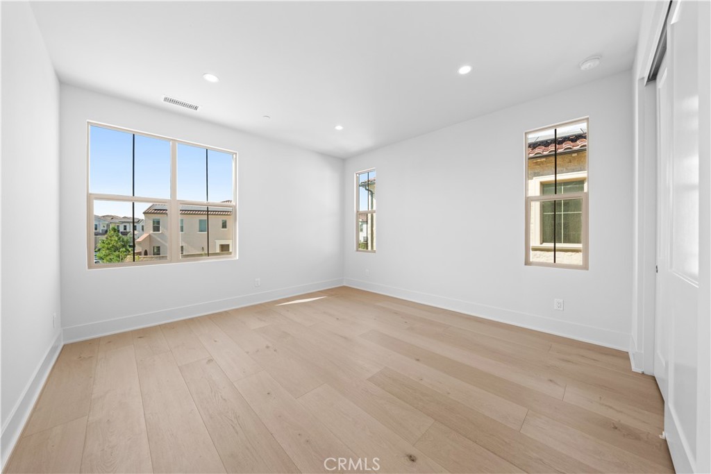 100 Mossvine Irvine, CA 92618 - Photo 30 of 44 a view of an empty room with a window
