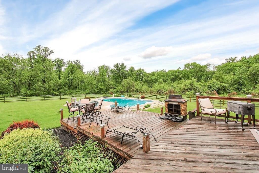 249 Walnut Garden Road Rising Sun, MD 21911 - Photo 24 of 28 Expansive Deck to Swift In-Ground Pool