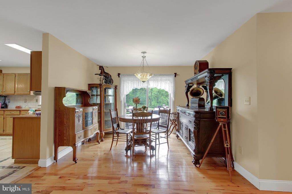 249 Walnut Garden Road Rising Sun, MD 21911 - Photo 6 of 28 Dining Room with Sliders to Deck