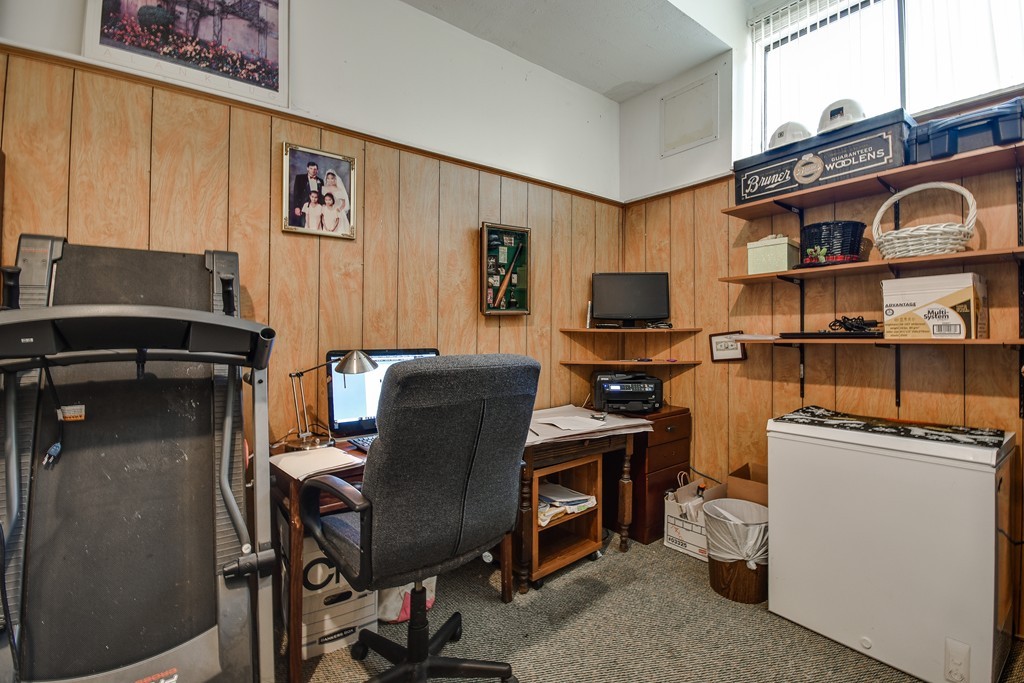124 Mountain Gate Road, Unit 124 Ashland, MA 01721 - Photo 18 of 19 a view of a workspace with furniture