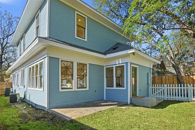 a view of a park with large trees