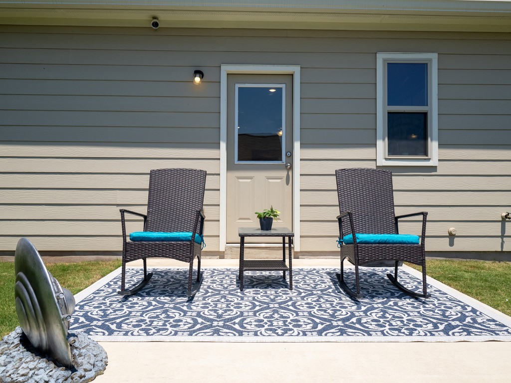 13019 Tarland Street Austin, TX 78754 - Photo 23 of 23 a bench sitting in front of a building