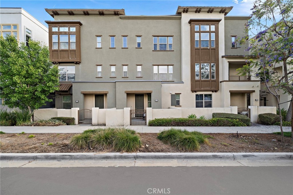 144 Paramount Irvine, CA 92618 - Photo 25 of 43 a front view of a building with garden