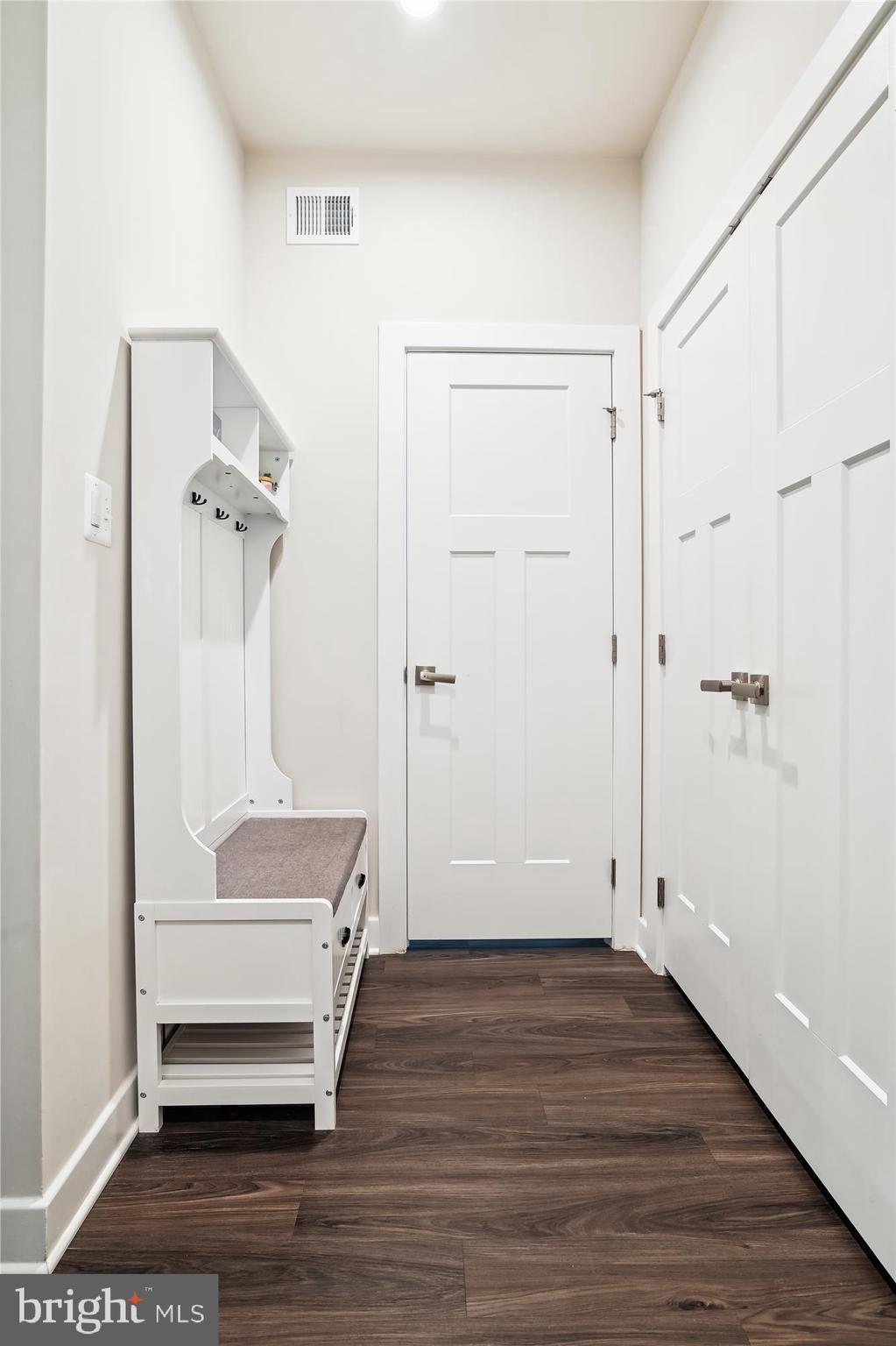 1279 Upper Patuxent Ridge Road Odenton, MD 21113 - Photo 34 of 107 MUDROOM W/ COAT CLOSET & LIGHT ON AUTOMATIC SENSOR