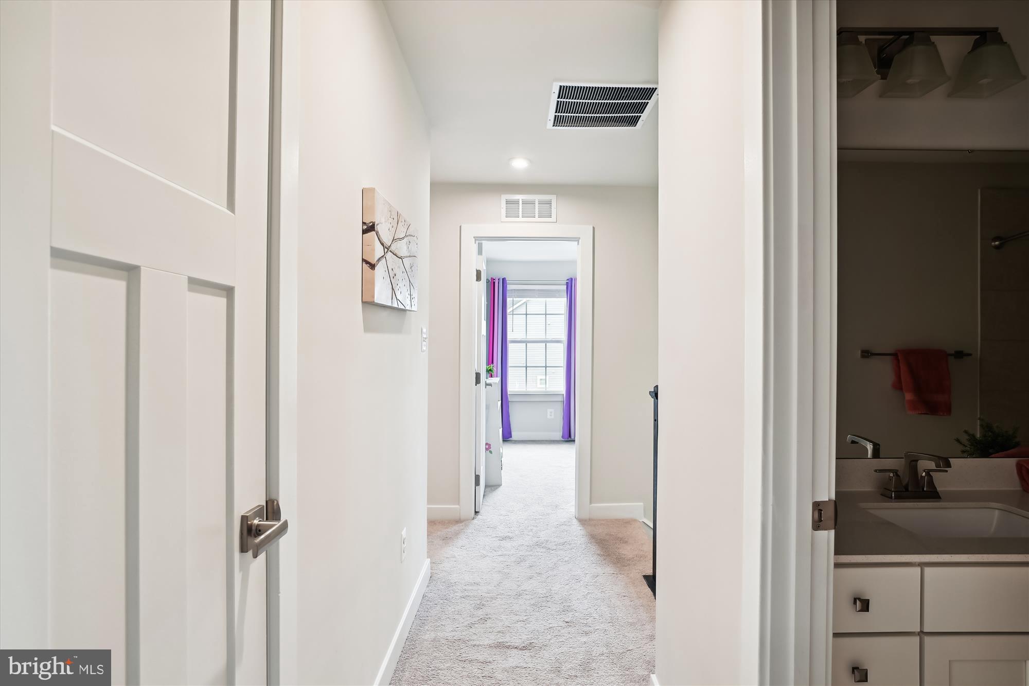 1279 Upper Patuxent Ridge Road Odenton, MD 21113 - Photo 50 of 107 WELL-LIT CARPETED HALLWAY