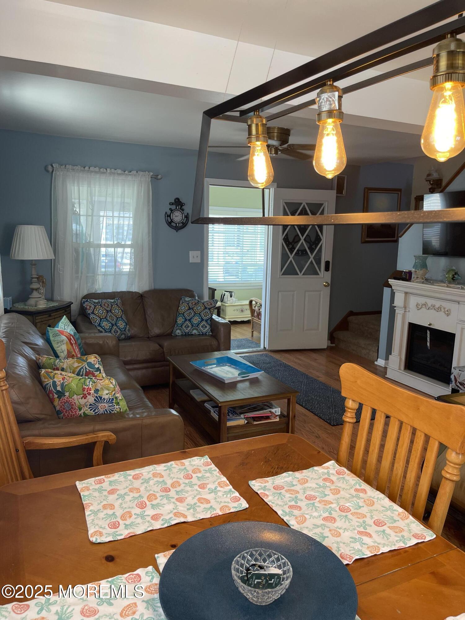 102 Brown Avenue Lavallette, NJ 08735 - Photo 16 of 22 a living room with furniture and a large window