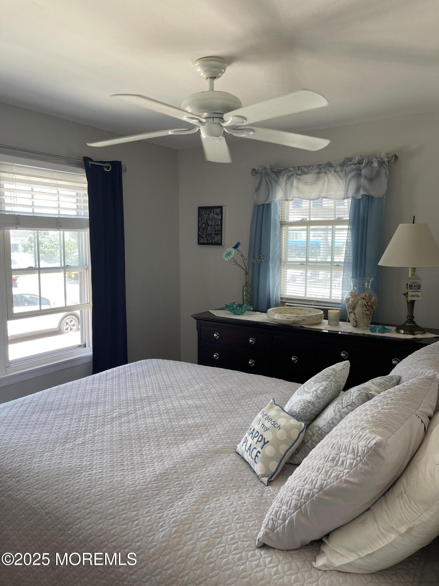 102 Brown Avenue Lavallette, NJ 08735 - Photo 17 of 22 a living room with furniture and a large window