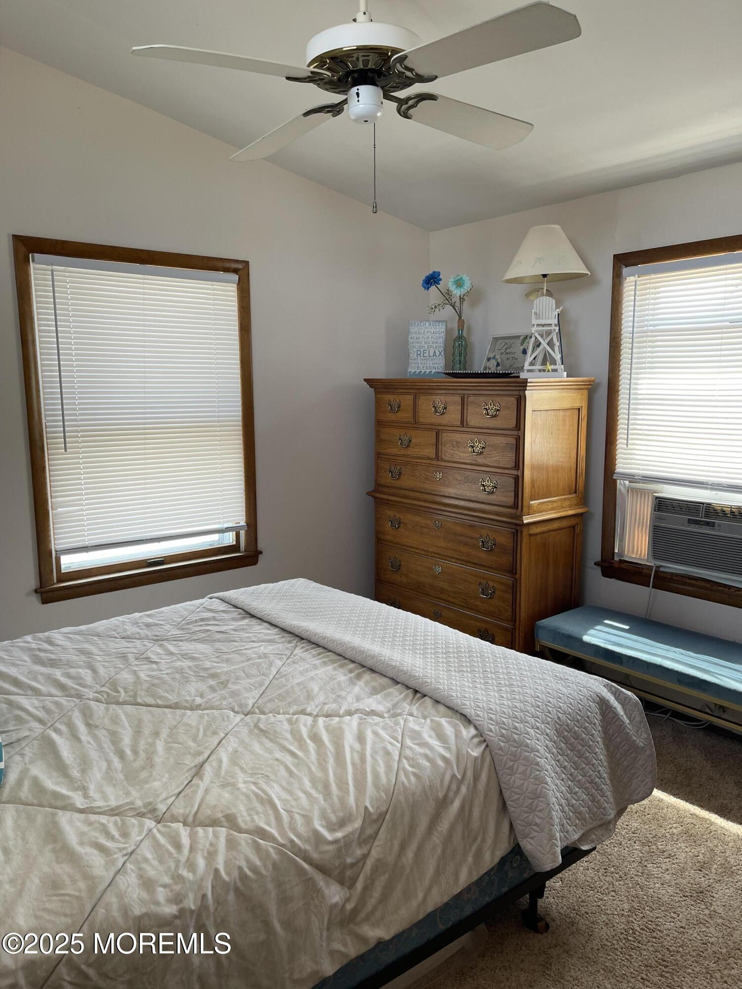 102 Brown Avenue Lavallette, NJ 08735 - Photo 9 of 22 a bedroom with a bed and a dresser