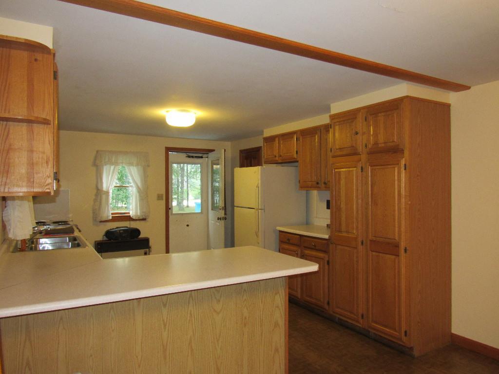 439 Perry Oliver Road Wells, ME 04090 - Photo 7 of 17 Breakfast bar, pantry and closet for...