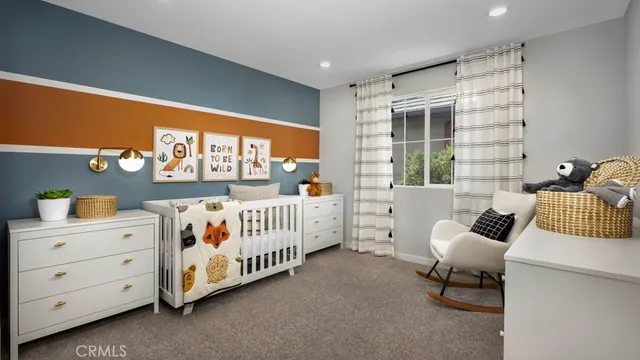 a living room with furniture a window and a dining table