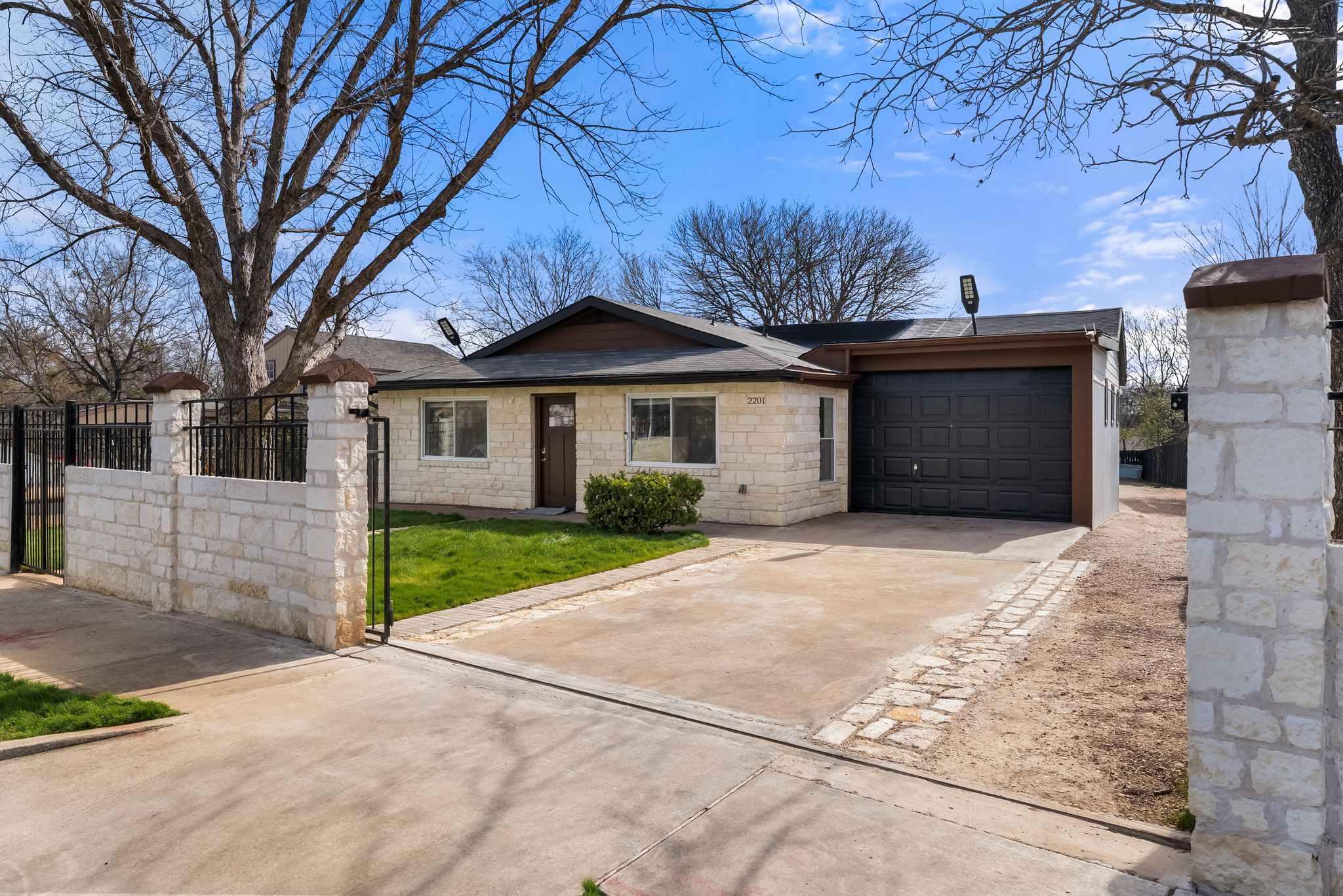 2201 Teri Road Austin, TX 78744 - Photo 1 of 37 front view of a house with a yard