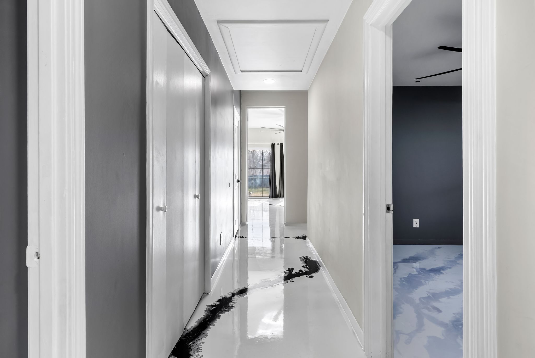 2201 Teri Road Austin, TX 78744 - Photo 14 of 37 a view of a hallway with wooden floor and a bathroom