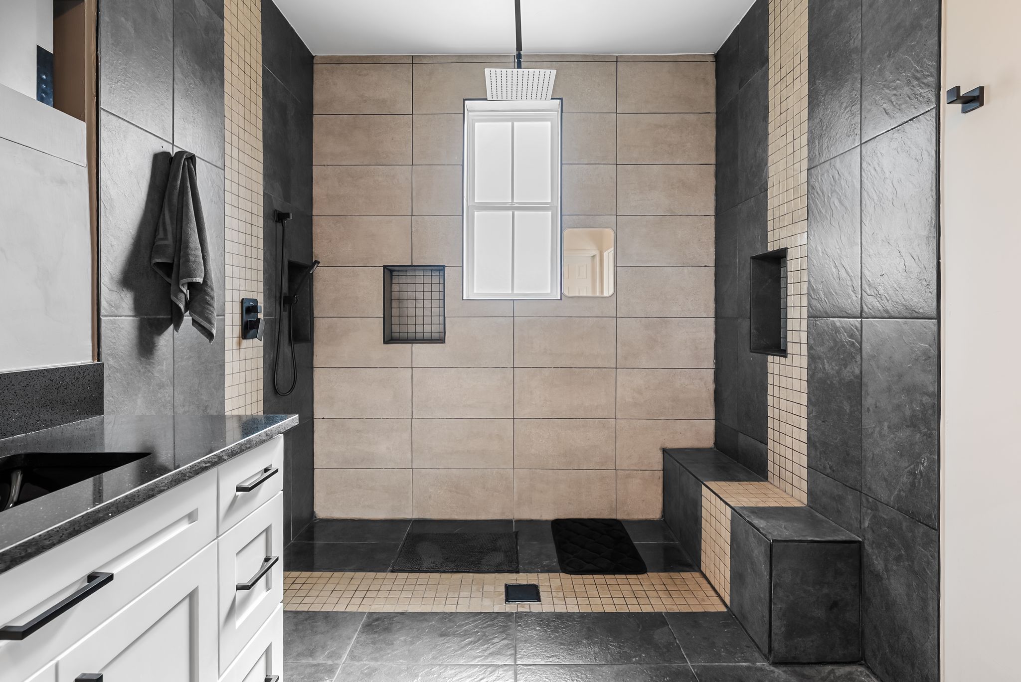 2201 Teri Road Austin, TX 78744 - Photo 20 of 37 a bathroom with a shower and a mirror