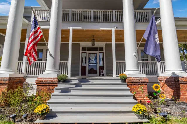 a front view of a house with a porch