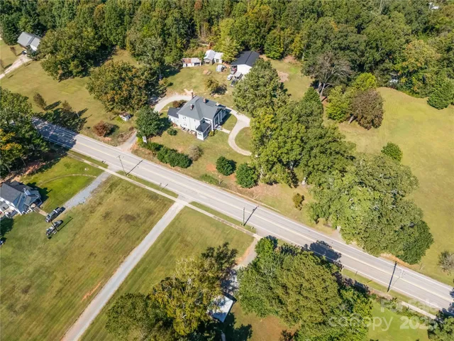 a view of a lake with a building in the background