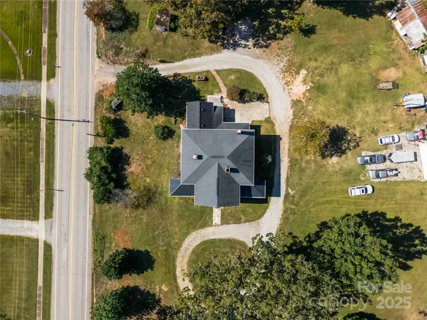 a aerial view of a house with a swimming pool