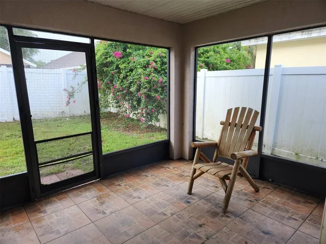 a view of two chairs in the room