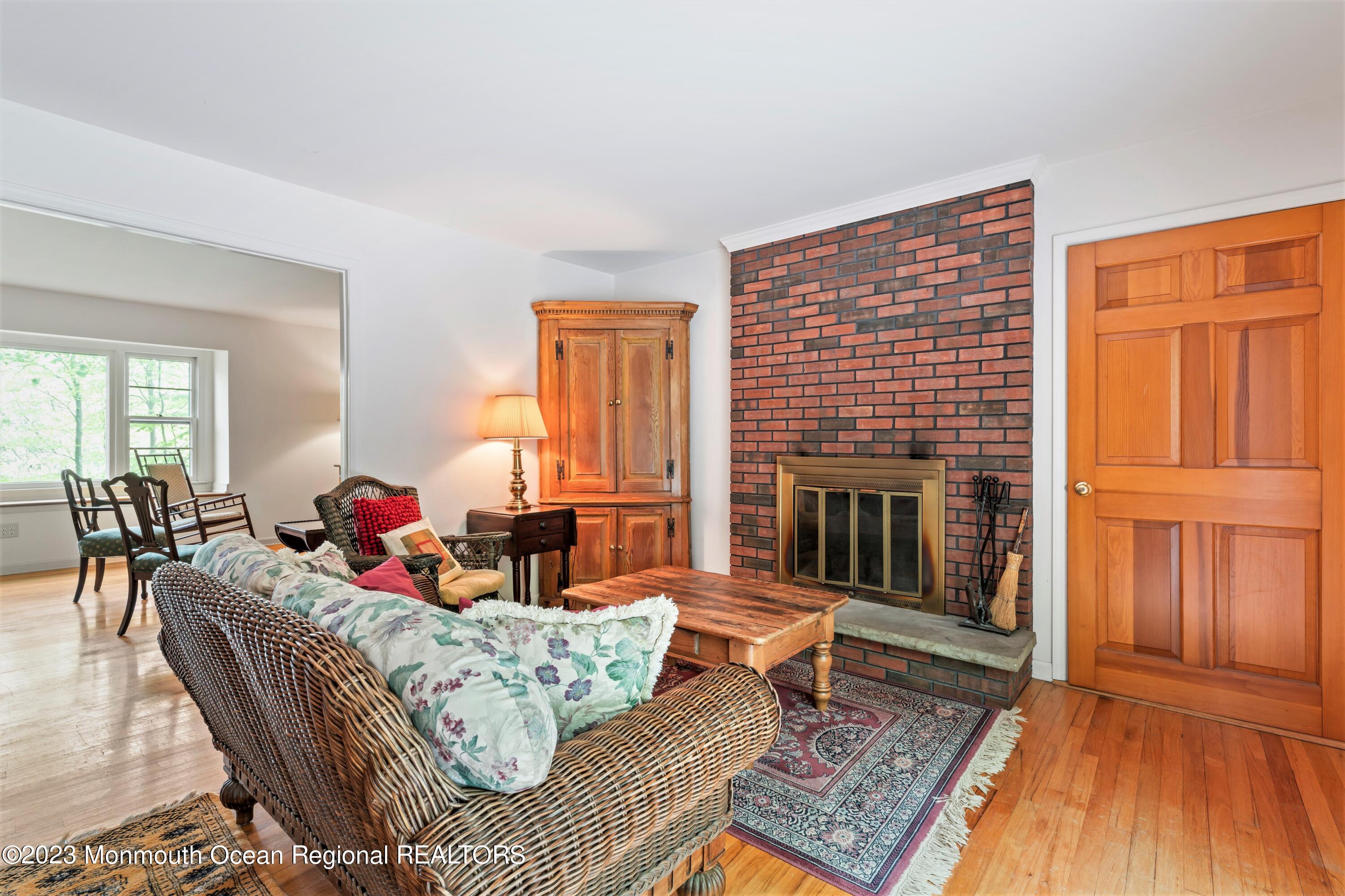 32 Borden Road Middletown, NJ 07748 - Photo 15 of 50 Den With Woodburning Fireplace