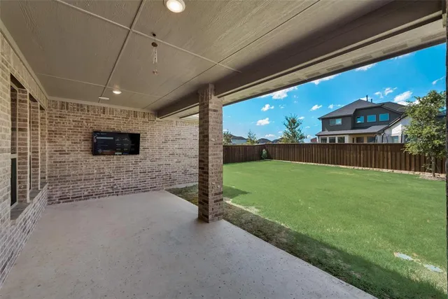 a view of a yard with a slide