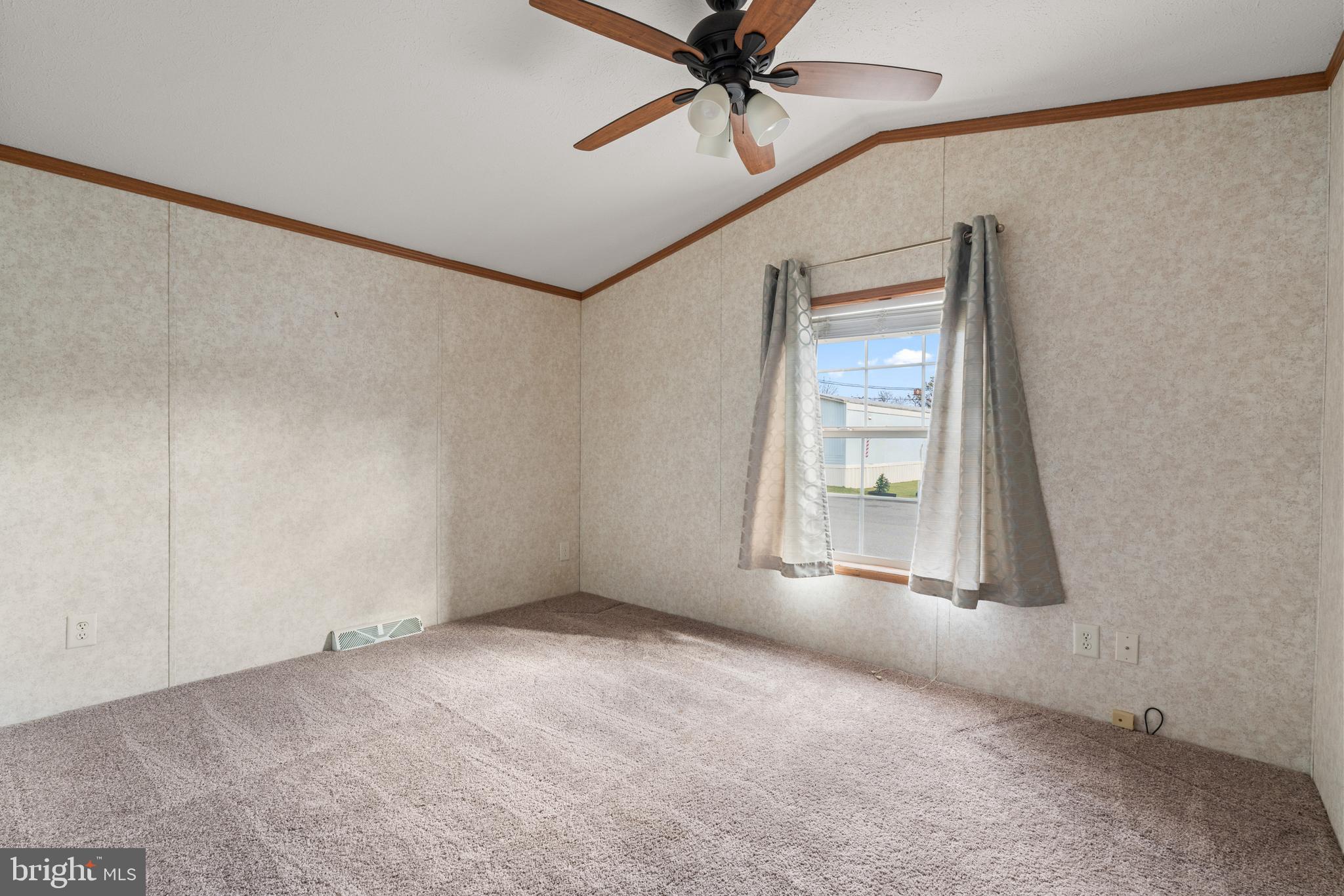 523 Canter Road Wilmington, DE 19810 - Photo 12 of 20 a view of an empty room with a window