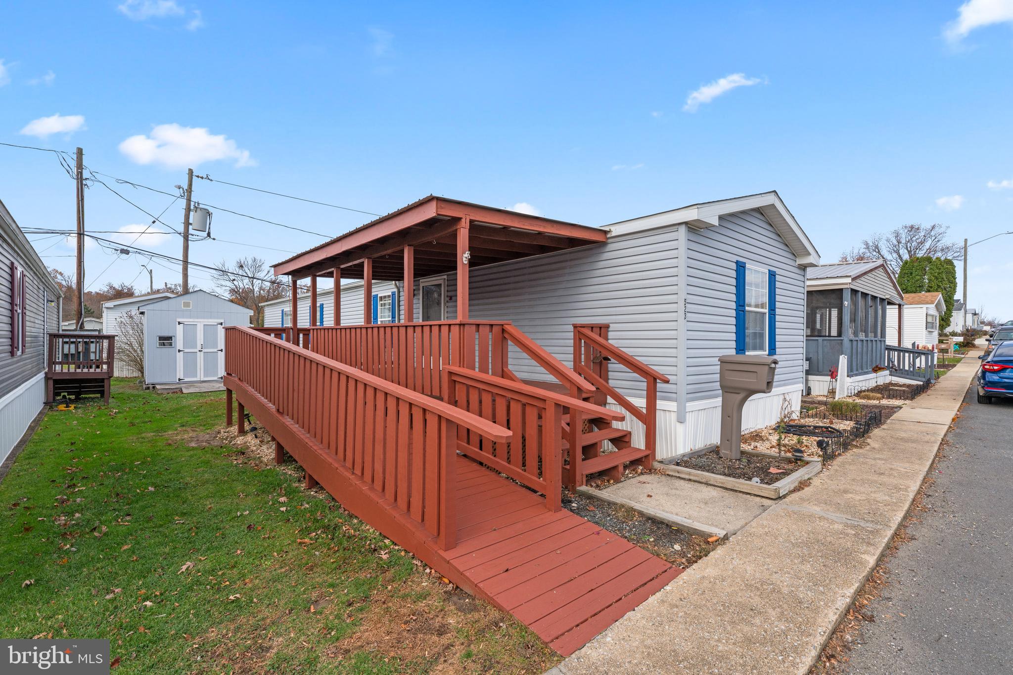 523 Canter Road Wilmington, DE 19810 - Photo 8 of 20 a front view of a house with yard and deck