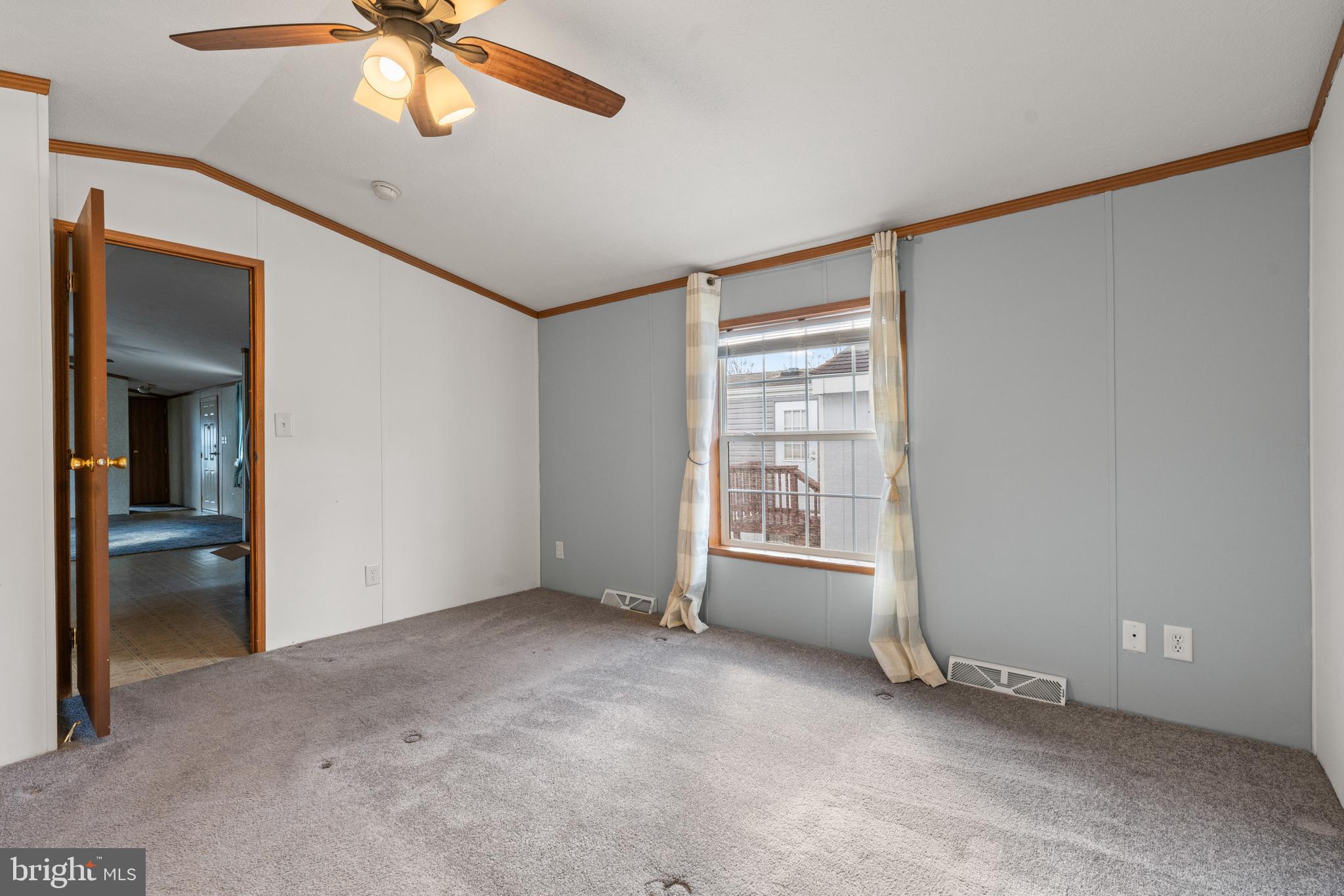 523 Canter Road Wilmington, DE 19810 - Photo 9 of 20 an empty room with chandelier fan