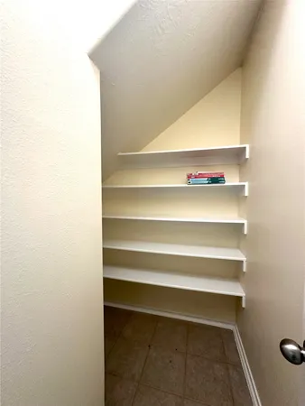 a view of room with empty racks